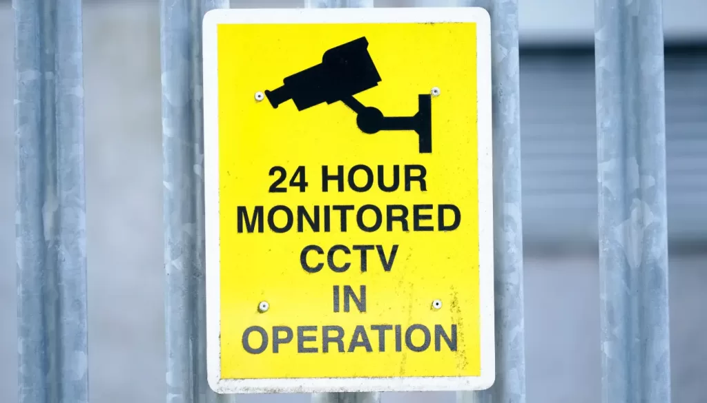 24 hours monitored CCTV in operation sign